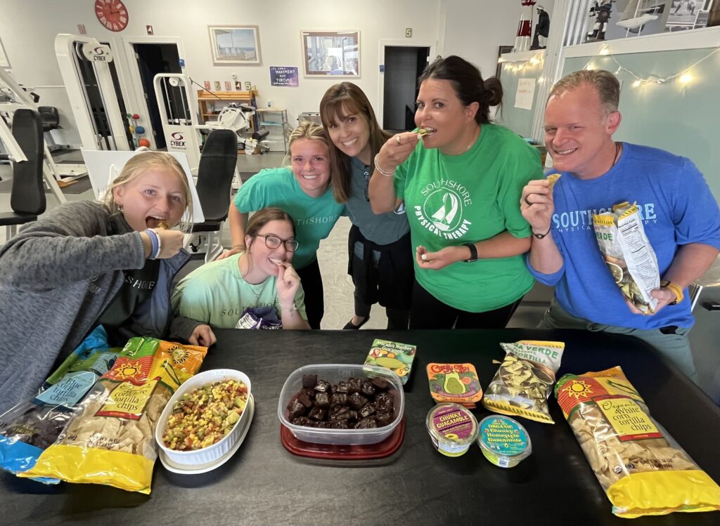 Southshore-Physical-Therapy_Metairie-Louisiana_National-Avocado-Day_green-clothes_smiling-staff_eating-avocado-recipes